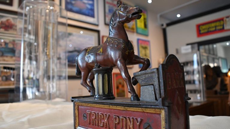 Antique and vintage coin-operated banks, toys, and machines at Pismo Beach Coins Etc Gallery, California